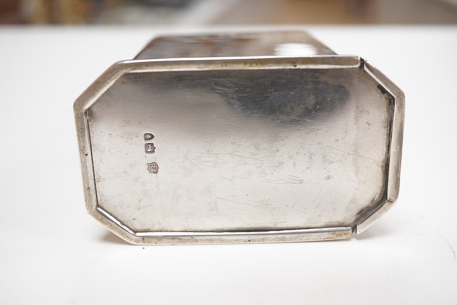 A late Victorian silver octagonal tea caddy, by Thomas Bradbury & Sons, London, 1895, 12.8cm and a Dutch? engraved white metal hexagonal silver marriage pot and cover, 8.3oz. Condition - poor to fair